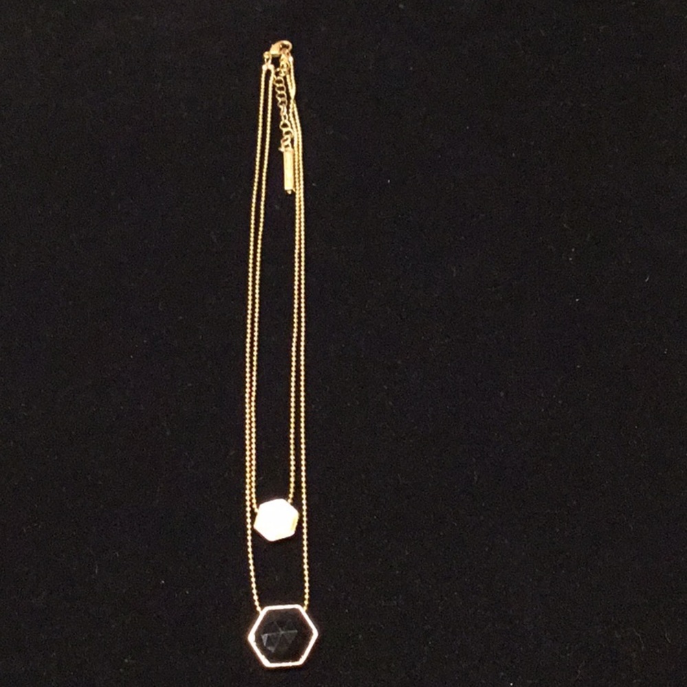 Metaphor double chain necklace gold tone.